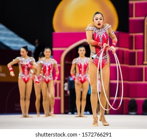 BAKU, AZERBAIJAN -16-22 SEPTEMBER, 2019: 37th FIG Rhythmic Gymnastics World Championships, Group finals, 3 hoops 4 clubs. Team Japan. - Shutterstock ID 1572766291