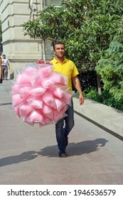 Baku, Azerbaijan - 2021: Male Cotton Candy Seller