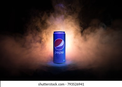 BAKU, AZERBAIJAN - JANUARY 13,2018 : Pepsi can against dark toned foggy background. Pepsi is a carbonated soft drink produced by PepsiCo.