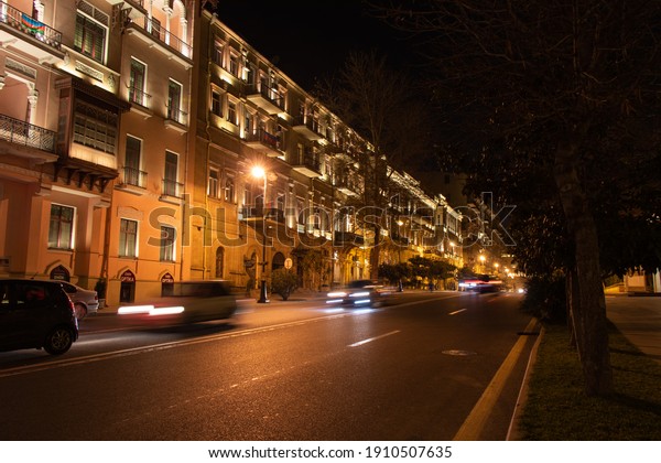 Baku - Azerbaijan: January\
2021. Long Exposure photography of Baku city street. Fast life in\
cities
