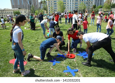 BAKU, AZERBAIJAN - JUNE 1 2019 : Kids Festival . In Park Of Heydar Aliyev Center. Kids Play Games