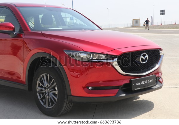 Baku, Azerbaijan - May 27, 2017:\
sneak preview and test-drive of second generation restyled Mazda\
CX-5 crossover SUV with an overhauled design and new\
tech