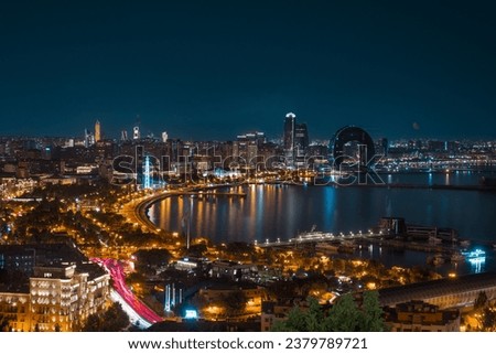 BAKU, AZERBAIJAN - SEPTEMBER 10, 2023 : Baku at night. The capital city of Azerbaijan. Aerial panoramic cityscape view. sea boulevard and street lights in the background.
 Foto stock © 
