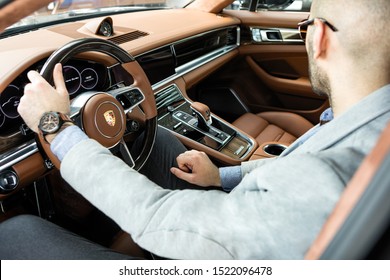 Baku, Nizami / Azerbaijan - 05-12-2018: Porsche Panamera Turbo Yellow Interior With Man Driver