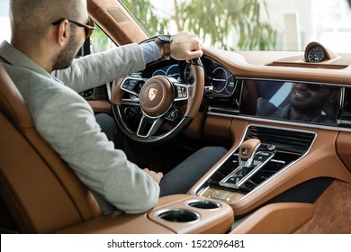 Baku, Nizami / Azerbaijan - 05-12-2018: Porsche Panamera Turbo Yellow Interior With Man Driver