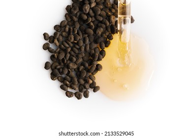 Bakuchiol seeds and Retinol gel drop, macro shot. - Shutterstock ID 2133529045