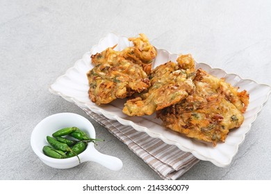 Bakwan Sayur Or Bala-bala Or Vegetable Fritter, Indonesian Snack Made From Flour, Cabbage, Carrots And Bean Sprouts, Served With Chili Or Chili Sauce. 