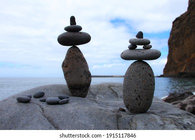 Balaced Stones On A Beach Symbolize Inner Peace And Balance