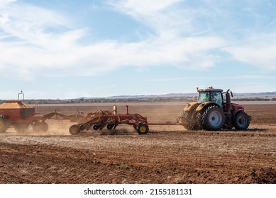 Balaklava SA, Australia - May 10, 2022:  Australian Farmers Working In The Fields With Agriculture Machinery In Rural Countryside