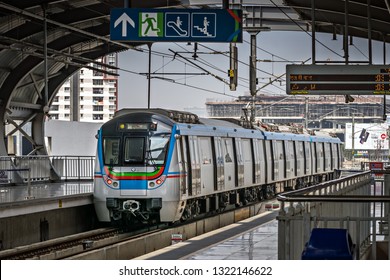 Balanagar, Hyderabad, Telangana, India- February 18th, 2019:Close up of Rapid transit  metro train exiting Balanagar station in the morning. The service has successfully completed one year recently.