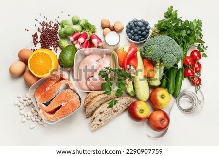 Balanced diet food background. Nutrition, clean eating food concept. Diet plan with vitamins and minerals.