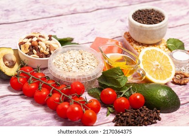 Balanced Diet Food Background. Organic Food For Healthy Nutrition, Vegetables,hercules,olive Oil,fish,herbs,nuts,dried Fruits, Seeds And Greens.