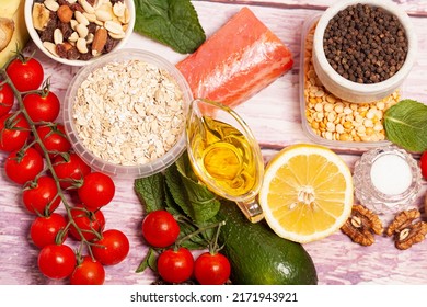 Balanced Diet Food Background. Organic Food For Healthy Nutrition, Vegetables,hercules,olive Oil,fish,herbs,nuts,dried Fruits, Seeds And Greens.