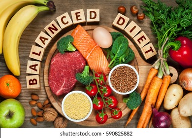 Balanced diet - healthy food on wooden table