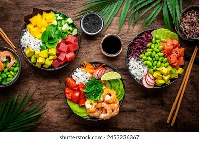 Balanced diet poke bowls with tuna, salmon, shrimp, vegetables, legumes, avocado and rice, wood table background, top view - Powered by Shutterstock