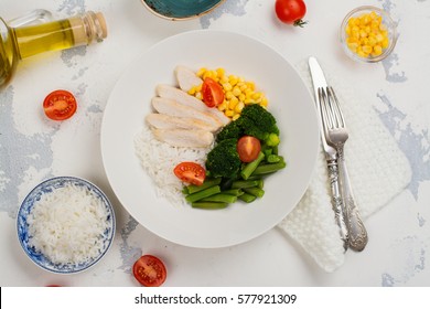 Balanced Meal Or Diet Concept. Chicken With Rice And Vegetables