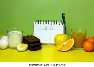 Balanced Nutrition Concept For Bland Diet. Weight Loss Planning. Milk, Bread, Eggs, Juice, Fruits On Yellow And Green Background. Copy Space.
