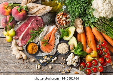 Balanced nutrition concept for clean eating flexitarian mediterranean diet. Assortment of healthy food ingredients for cooking on a kitchen table. Top view flat lay background - Powered by Shutterstock