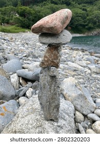 Balanced rock stack on a rocky riverbed
