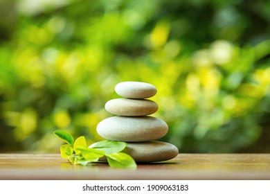 Balancing Pile Of Pebble Stones, Like ZEN Stone, Outdoor In Springtime, Spa Wellness Tranquil Scene Concept, Soul Equanimity Mental Calmness Picture