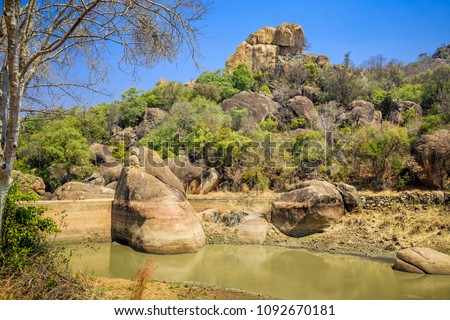 Balancing rocks in Matobo National Park, Zimbabwe, formed by millions of years of weathering. September 11, 2016.