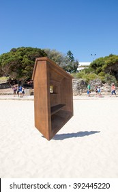 Balancing Sculpture And People At Sculptures By The Sea 2016/Balanced /COTTESLOE,WA,AUSTRALIA-MARCH 12,2016: Balancing Sculpture At Sculptures By The Sea With People In Cottesloe, Western Australia.