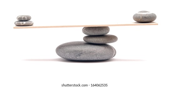 balancing stones on white