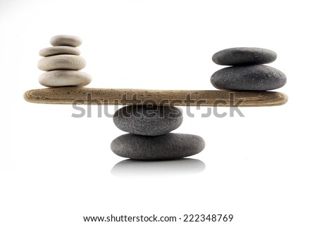 balancing stones on white background