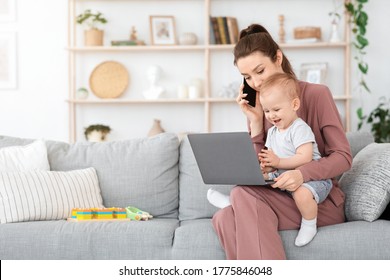 Balancing Work And Motherhood. Young Mom Holding Baby While Talking On Phone And Working On Laptop At Home, Free Space