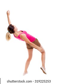 Balancing young woman.  or dodge falling woman. Rear view people collection.  backside view of person.  Isolated over white background. The girl in brown shorts and a pink shirt falls on his back.