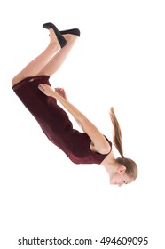 Balancing young woman.  or dodge falling woman. Rear view people collection.  backside view of person.  Isolated over white background. A girl in a burgundy dress falls head down.