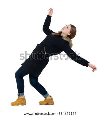Balancing young woman in parka.  or dodge falling woman. Rear view people collection.  backside view of person.  Isolated over white background. Leaning back on the woman.