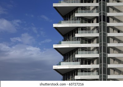 Balconies of modern hotel on the blue sky background