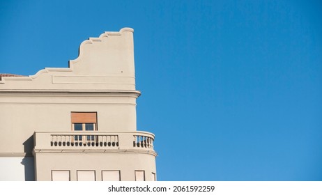 Balcony In Corner Top Of A Grey Building