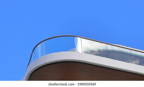 Balcony With Curved Glass Balustrade