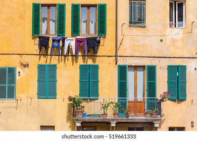 Balcony And Drying Clothes On The Facade