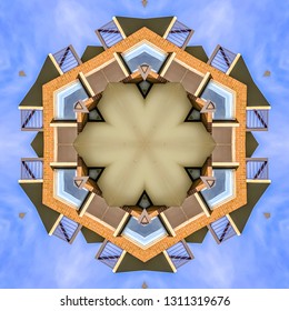 Balcony Fractal Photo Made From Real Estate Image. Geometric Kaleidoscope Pattern On Mirrored Axis Of Symmetry Reflection. Colorful Shapes As A Wallpaper For Advertising Background Or Backdrop.