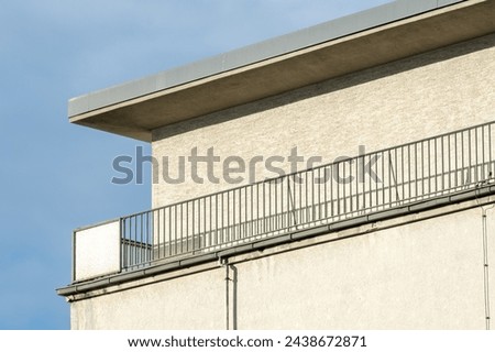 Balcony gallery under flat roof