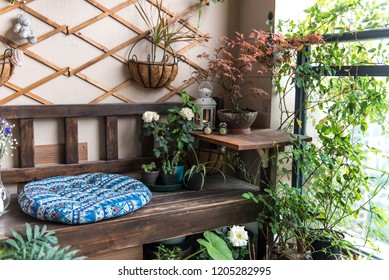 Balcony garden with seating plant view - Shutterstock ID 1205282995