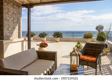 Balcony Overlooking The Sea. Relaxation Area On A Large Modern Terrace In A New Building On The First Line With Panoramic Sea Views.  Luxury Vacation Rental. Overseas Property On The Sea Coast.