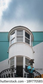 A Balcony With A Statue Of Lord Horatio Nelson And Dukes Lane Sign