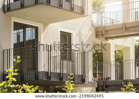 Balcony, Terrace, Bridge in Modern Residential Building. Balcony Steel Rail. Facade with Balconies Metal Railings.
