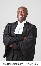 Bald Black Men In His Forty With Great Big Smile Wearing A Canadian Lawyer Toga