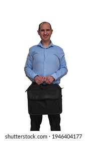 A Bald Guy Dressed In Blue Shirt And Black Pants Holding A Bag With A Laptop Computer Isolated On White Background With Both Hands. May Be An Office Worker Or Banker.