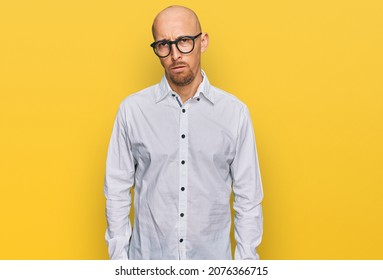 Bald Man With Beard Wearing Business Shirt And Glasses Skeptic And Nervous, Frowning Upset Because Of Problem. Negative Person. 