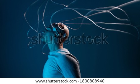 bald man with electrodes in his brain, a man of the future with technological additions, the brain is connected to virtual reality, additional opportunities for the brain, expansion of consciousness.