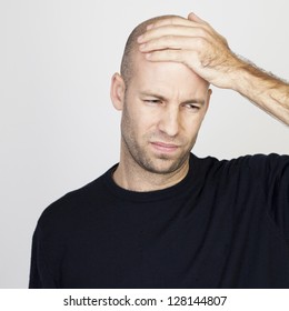 Bald Man With Headache