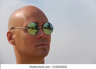 What glasses suit a bald head