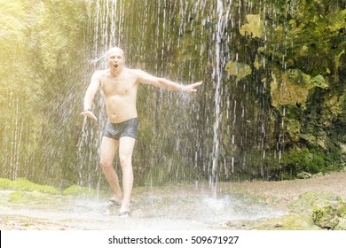 Bald Man Under The Waterfall