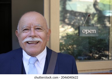 Bald senior businessman with a mustache